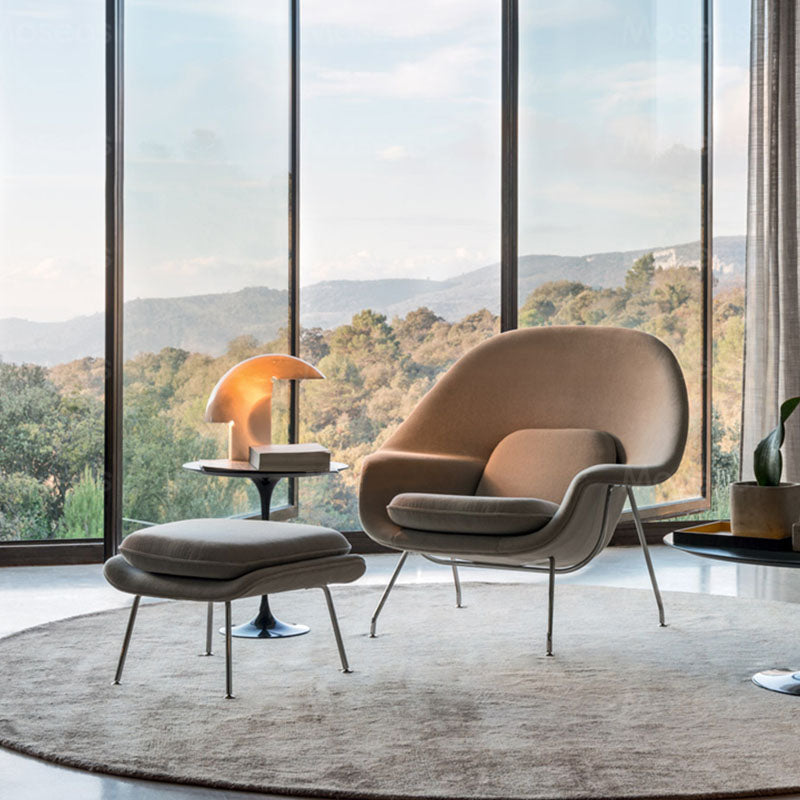 Classic Womb Chair & Ottoman, In Premium Velvet or Linen, Sky BlueDescription



The mid century style armchair with ottoman, created by Eero Saarinen for Knoll in 1948, has become an iconic piece of modernist design. The velvet ar