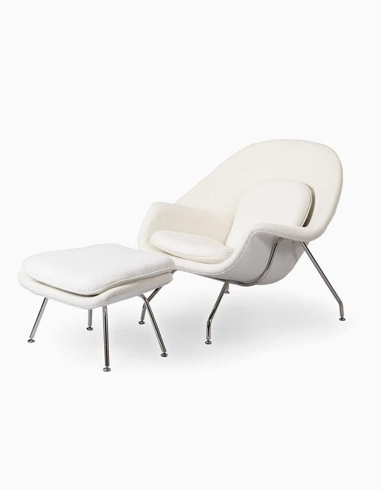 Womb Style Chair & Ottoman In Premium Velvet or Linen, WhiteDescription



The Swoon Lounge Chair, designed by Space Copenhagen, offers a blend of elegance and comfort. With its flowing curves and sculptured shape, this uniqu
